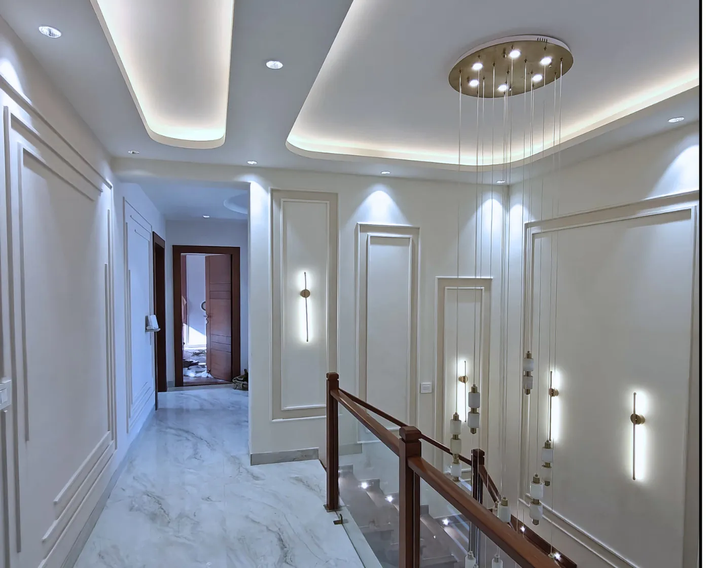 Turnkey home corridor and staircase interior by NeeV InteriorS, Gurugram